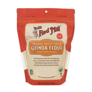 Bag of Bob's Red Mill organic whole grain quinoa flour on a white background