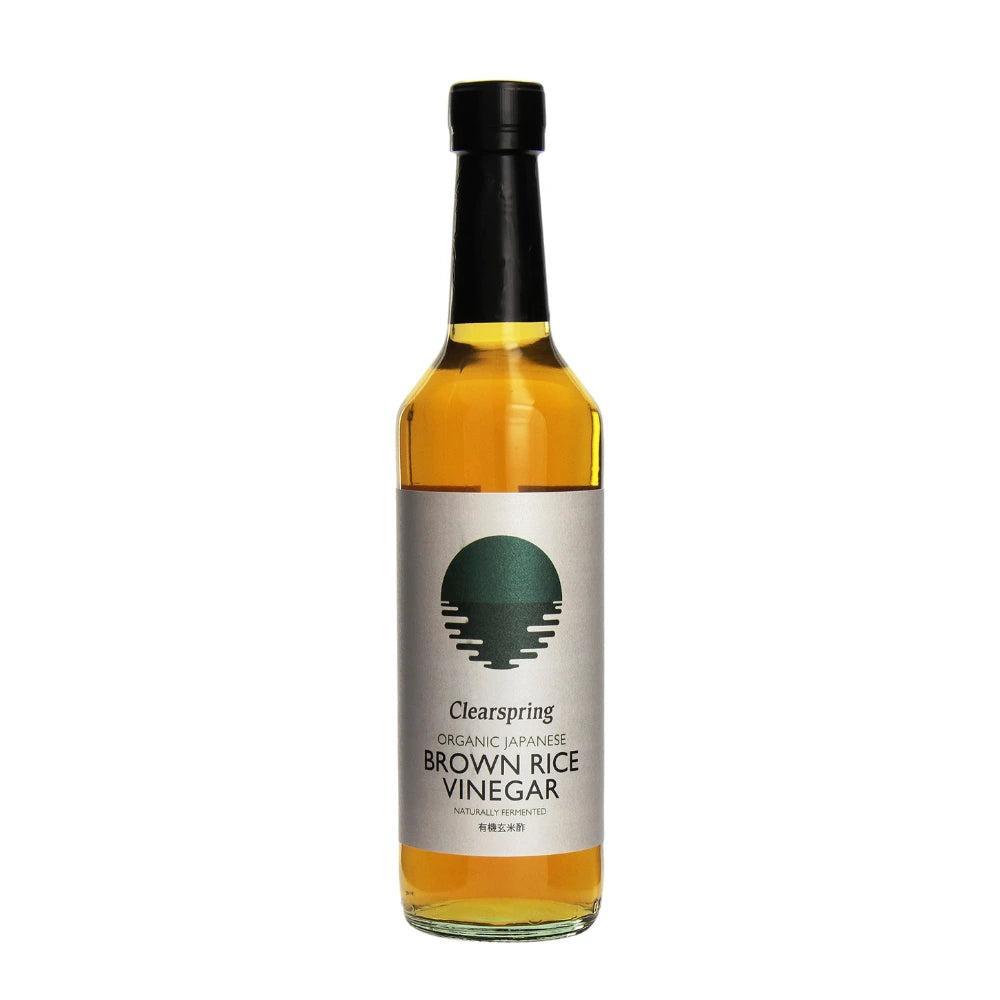 Bottle of Clearspring Brown Rice Vinegar on a white background