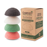 Stack of four colored konjac sponges with Composty packaging on a white background
