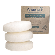 Three white baby sponges stacked with a Composty branded box in the background.