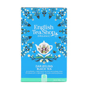 Box of English Tea Shop Darjeeling Black Tea on a white background