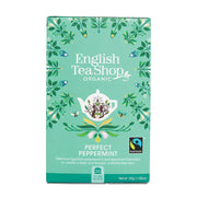 Tea box from English Tea Shop with green design and teapot illustration on a white background