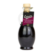 Bottle of Epicure Pomegranate Molasses on a white background
