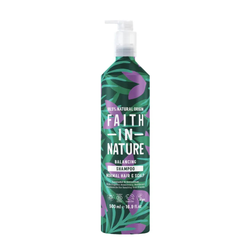 Bottle of Faith in Nature shampoo with leaf design on a white background