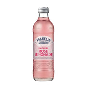 Pink lemonade bottle with Franklin & Sons label on a white background