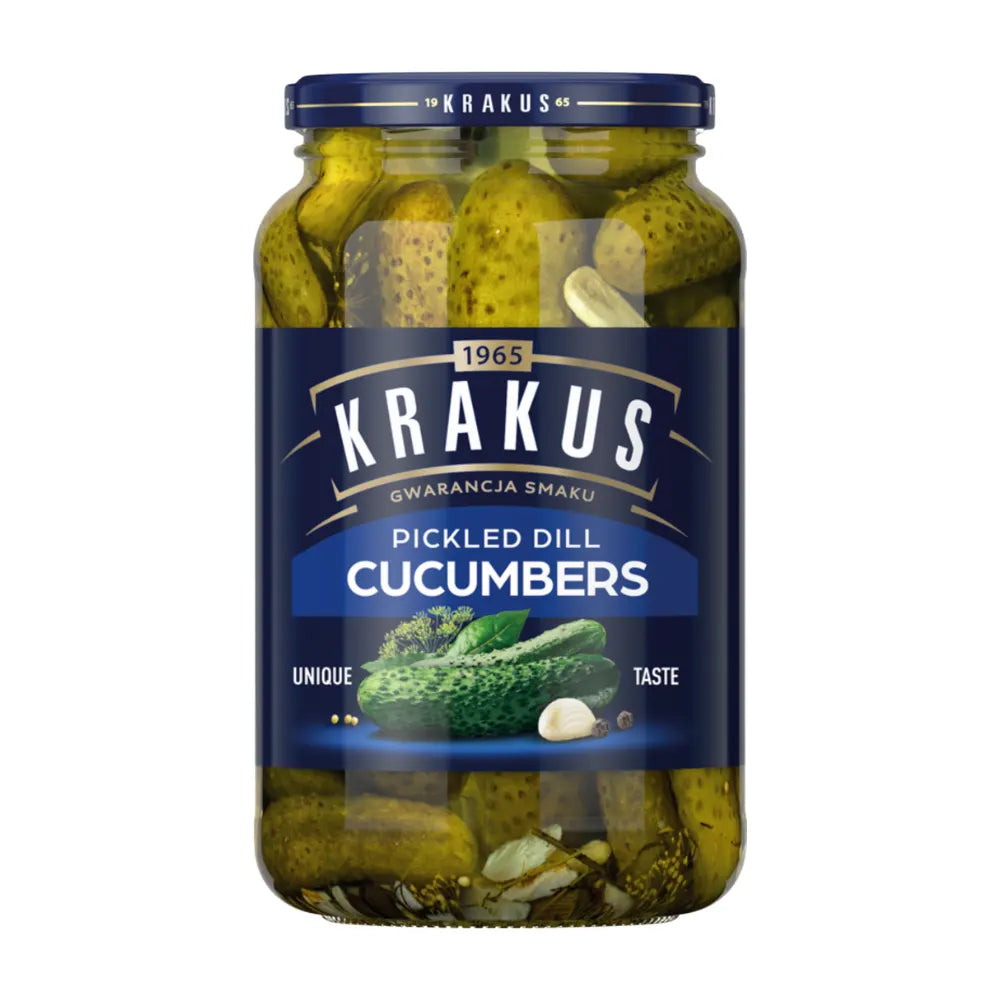 Jar of Krakus pickled dill cucumbers on a white background