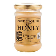 Jar of pure English set honey from Littleover Apiary on a white background