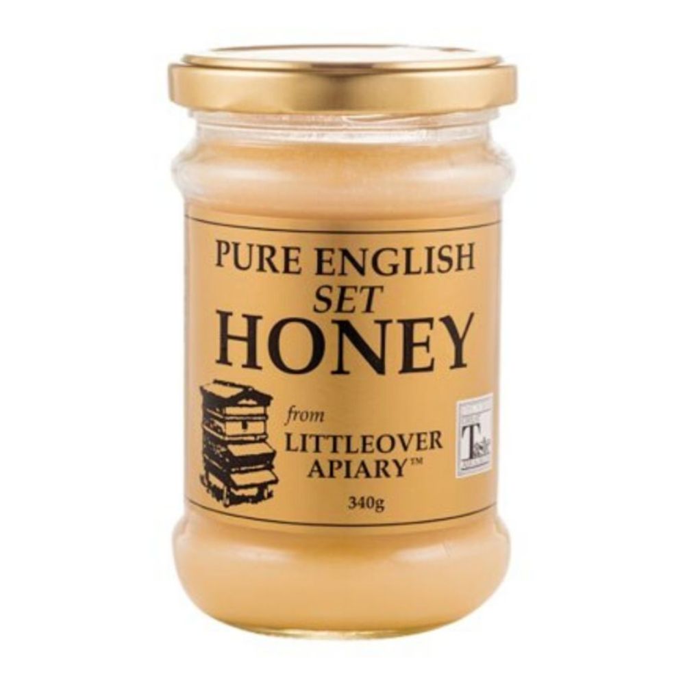 Jar of pure English set honey from Littleover Apiary on a white background