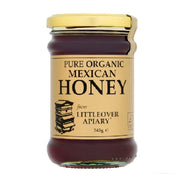 Jar of pure organic Mexican honey from Littleover Apiary on a white background