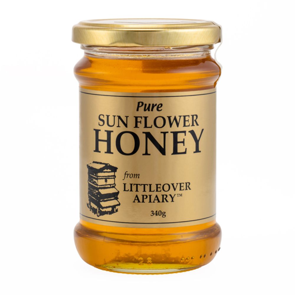 Jar of pure sunflower honey from Littleover Apiary on a white background