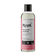 Miniml balancing shampoo bottle with pink label on a white background