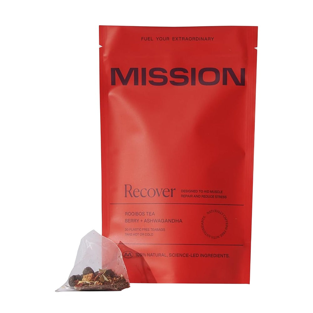 Red 'Mission' tea package with a tea bag on a white background