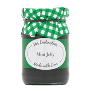 Jar of Mint Jelly with a green checkered lid on a white background