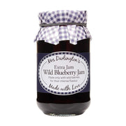 Jar of Mrs Darlington's Wild Blueberry Jam with a checkered lid on a white background