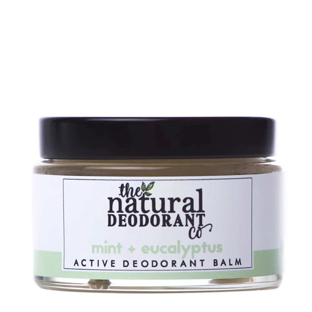 Jar of active deodorant balm with 'The Natural Deodorant Co' label on a white background