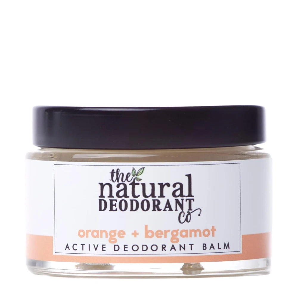 Jar of active deodorant balm with 'The Natural Deodorant Co' label on a white background