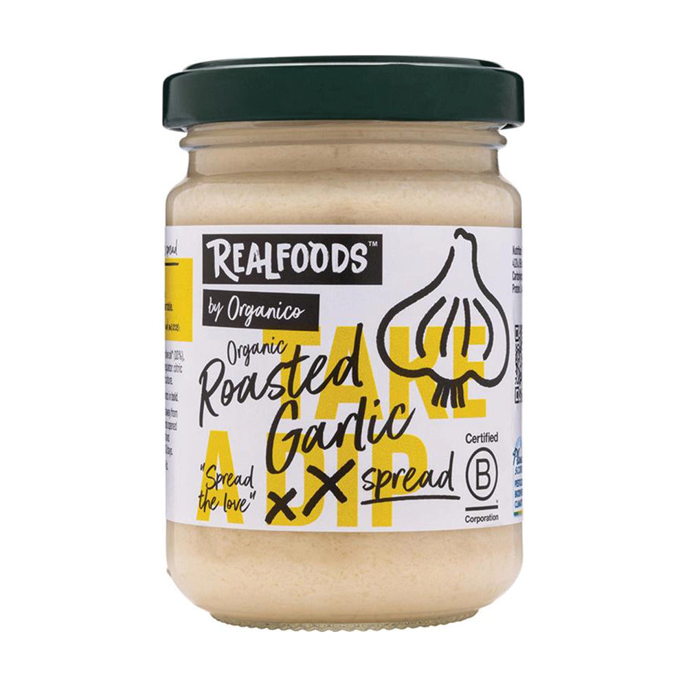 Jar of Realfoods roasted garlic spread on a white background