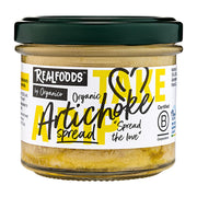 Jar of Realfoods Organic Artichoke spread with a black lid on a white background