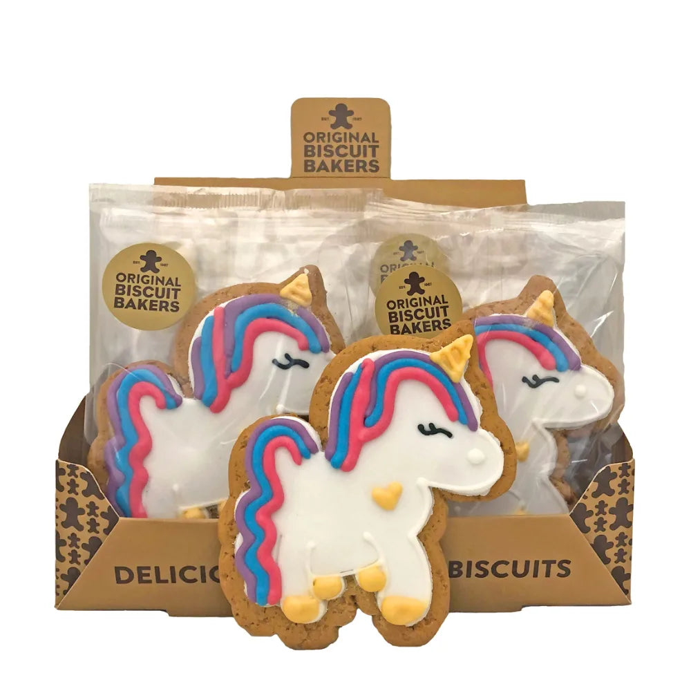 Packaged unicorn-shaped biscuits with colorful designs in a clear plastic sleeve.