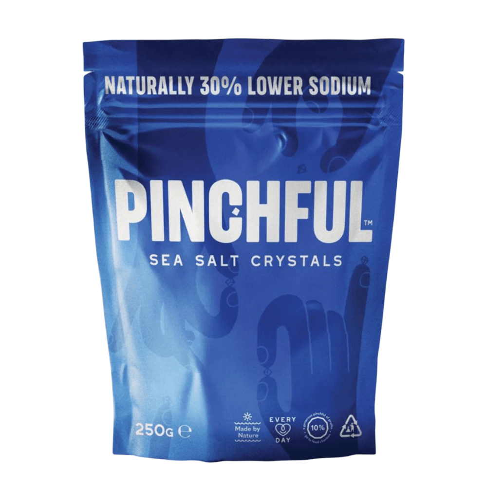 Blue package of Pinchful sea salt crystals on a white background