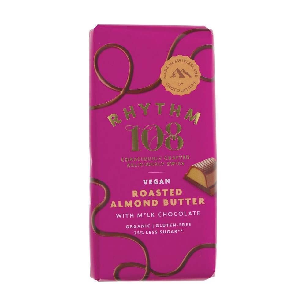 Pink packaging of Rhythm 108 vegan roasted almond butter with milk chocolate on a white background