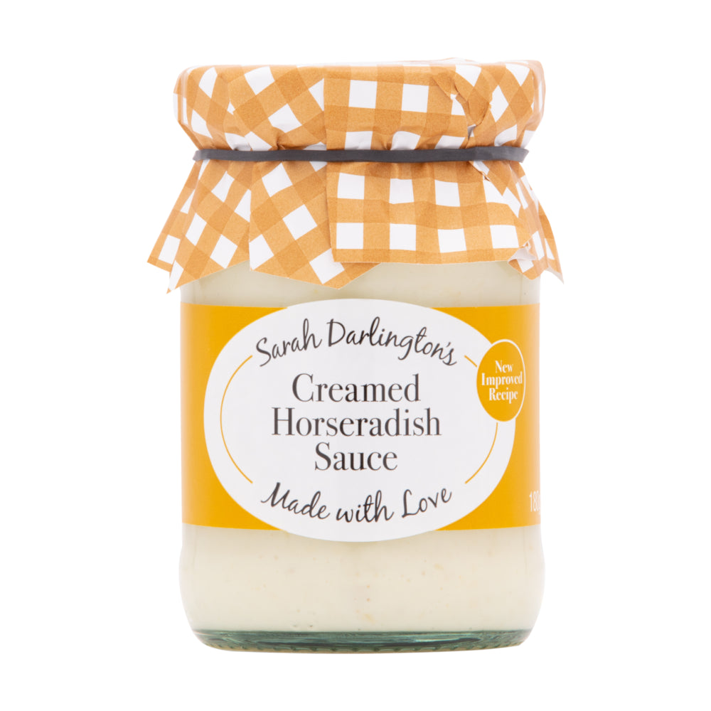 Jar of Sarah Darlington's Creamed Horseradish Sauce with a checkered lid on a white background