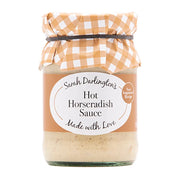 Jar of Sarah Darlington's Hot Horseradish Sauce with a checkered lid on a white background