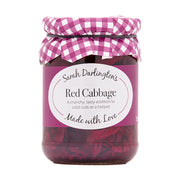 Jar of Sarah Darlington's Red Cabbage with a pink and white checkered lid on a white background