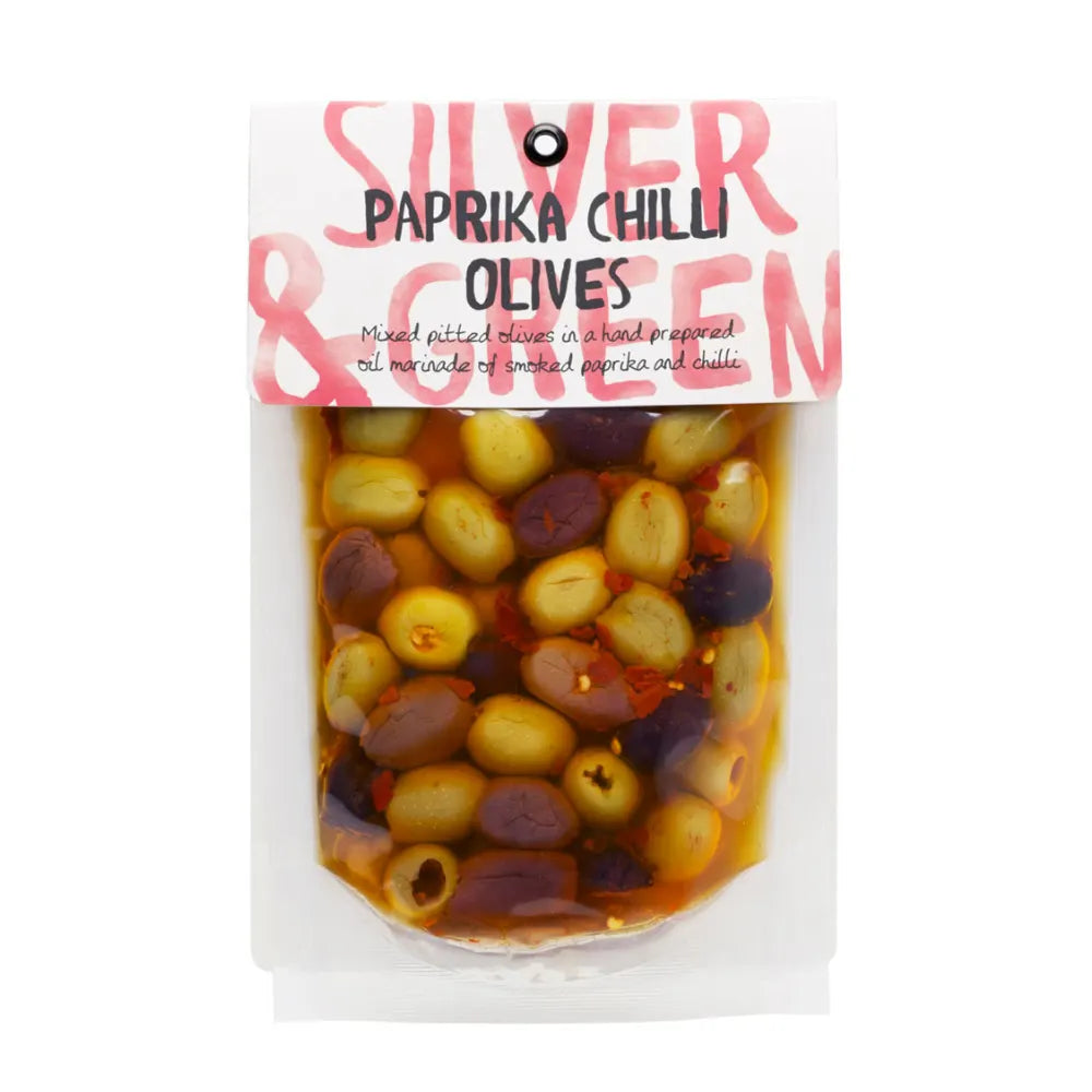 Packaged olives with paprika and chilli flavor on a white background