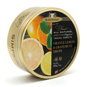 Simpkins orange lemon and grapefruit drops tin on a white background