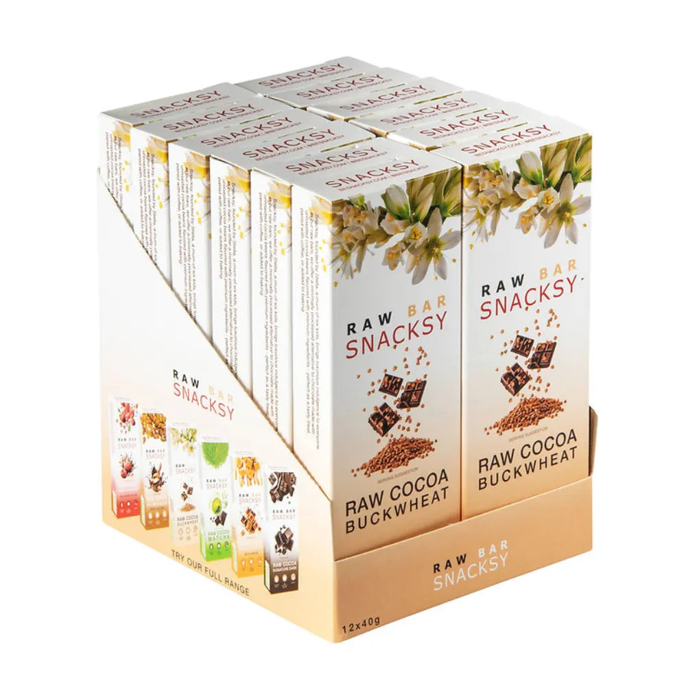 Box of Snacksy raw cocoa buckwheat bars on a white background