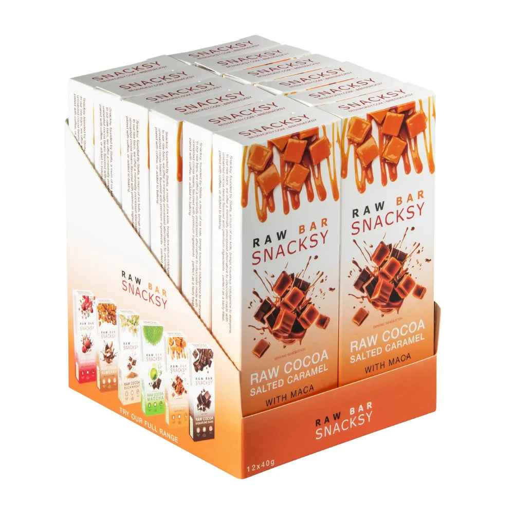 Box of Snacksy Raw Bar snacks with a focus on raw cocoa salted caramel flavor.