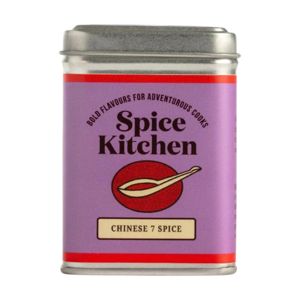 Spice tin labeled 'Spice Kitchen' with a purple label and red accents on a white background