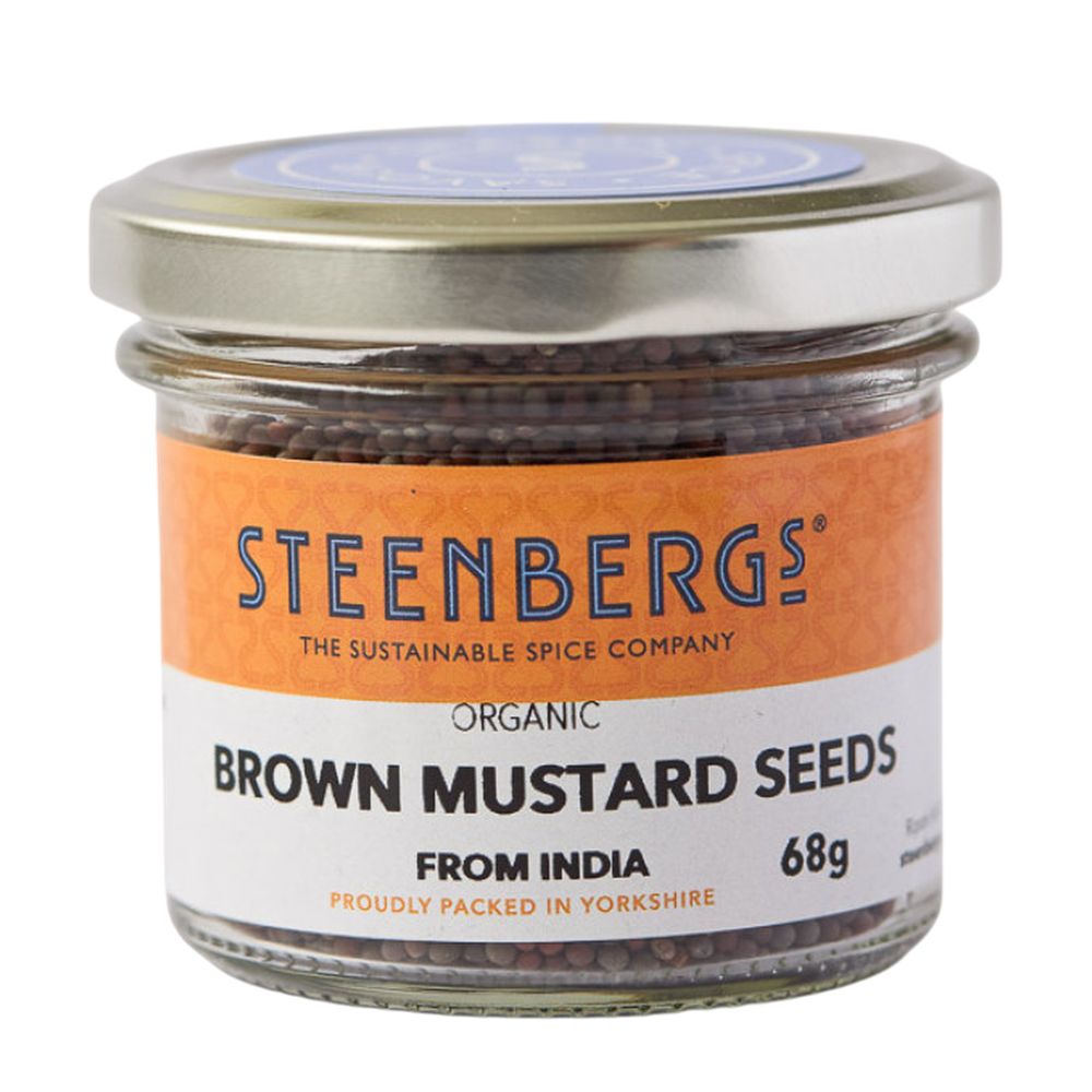 Jar of Steenbergs organic brown mustard seeds on a white background