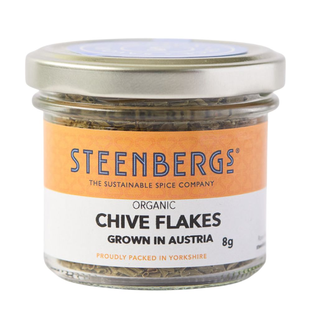 Jar of Steenbergs organic chive flakes on a white background