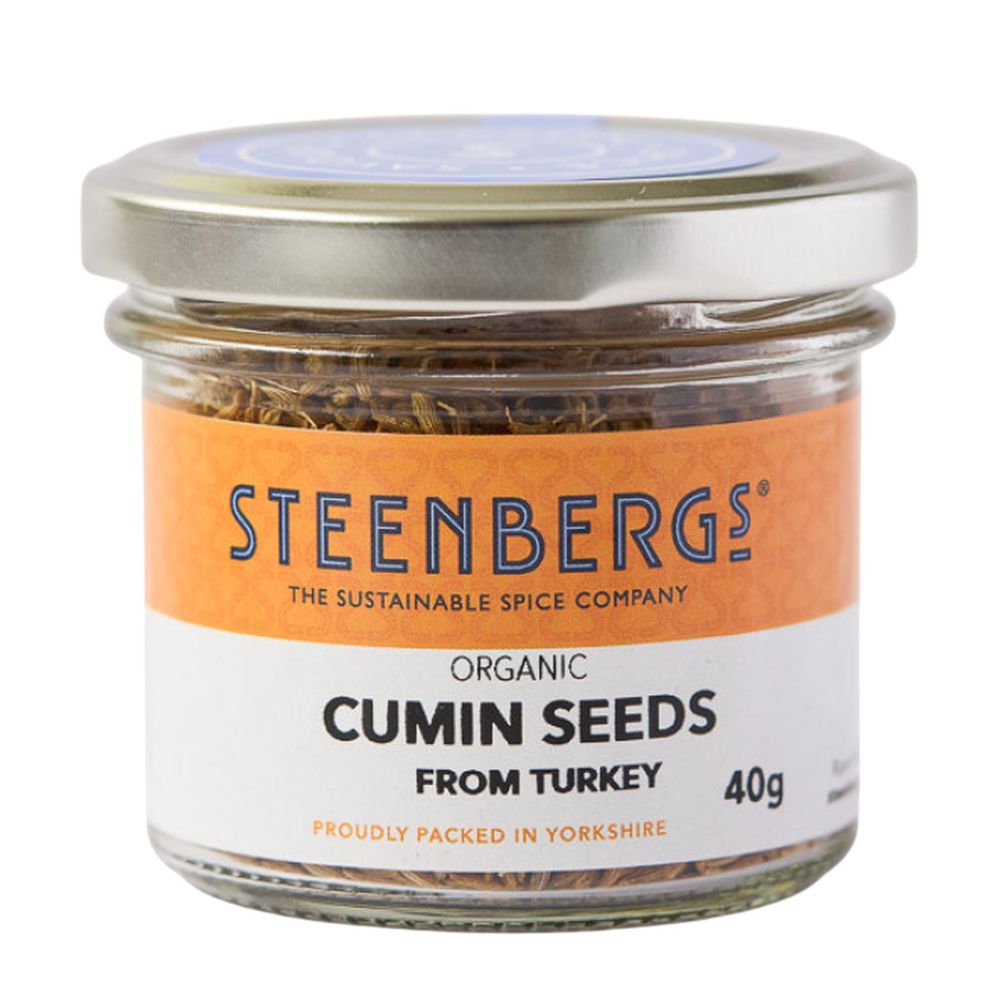 Jar of Steenbergs organic cumin seeds with an orange label on a white background