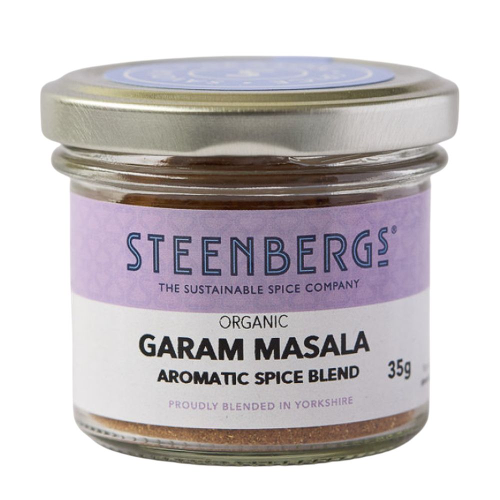 Jar of Steenbergs Organic Garam Masala spice blend on a white background