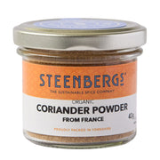 Jar of Steenbergs organic coriander powder on a white background