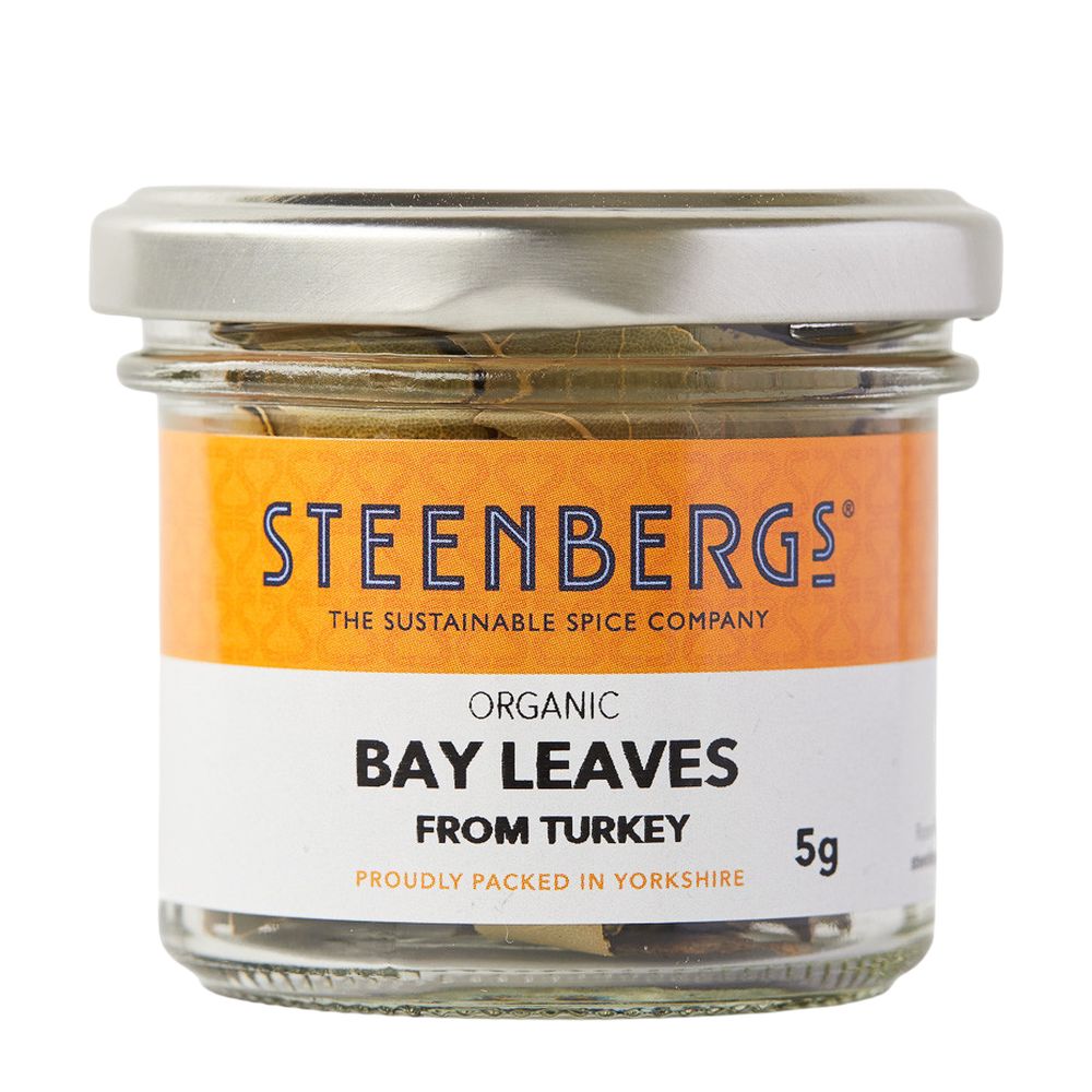 Jar of Steenbergs organic bay leaves with an orange label on a white background