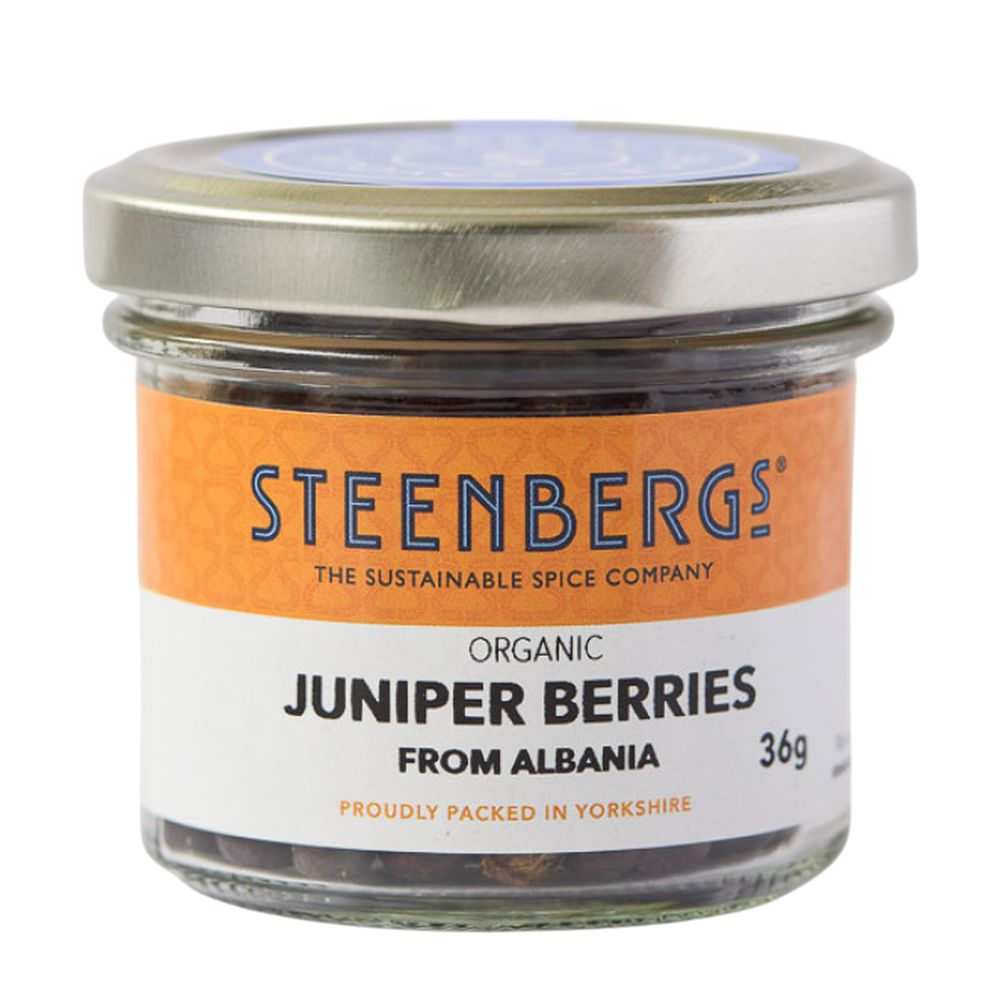 Jar of Steenbergs organic juniper berries on a white background