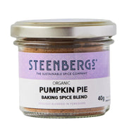 Steenbergs organic pumpkin pie baking spice blend in a glass jar on a white background
