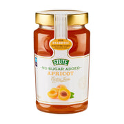 Jar of Stute no sugar added apricot jam on a white background