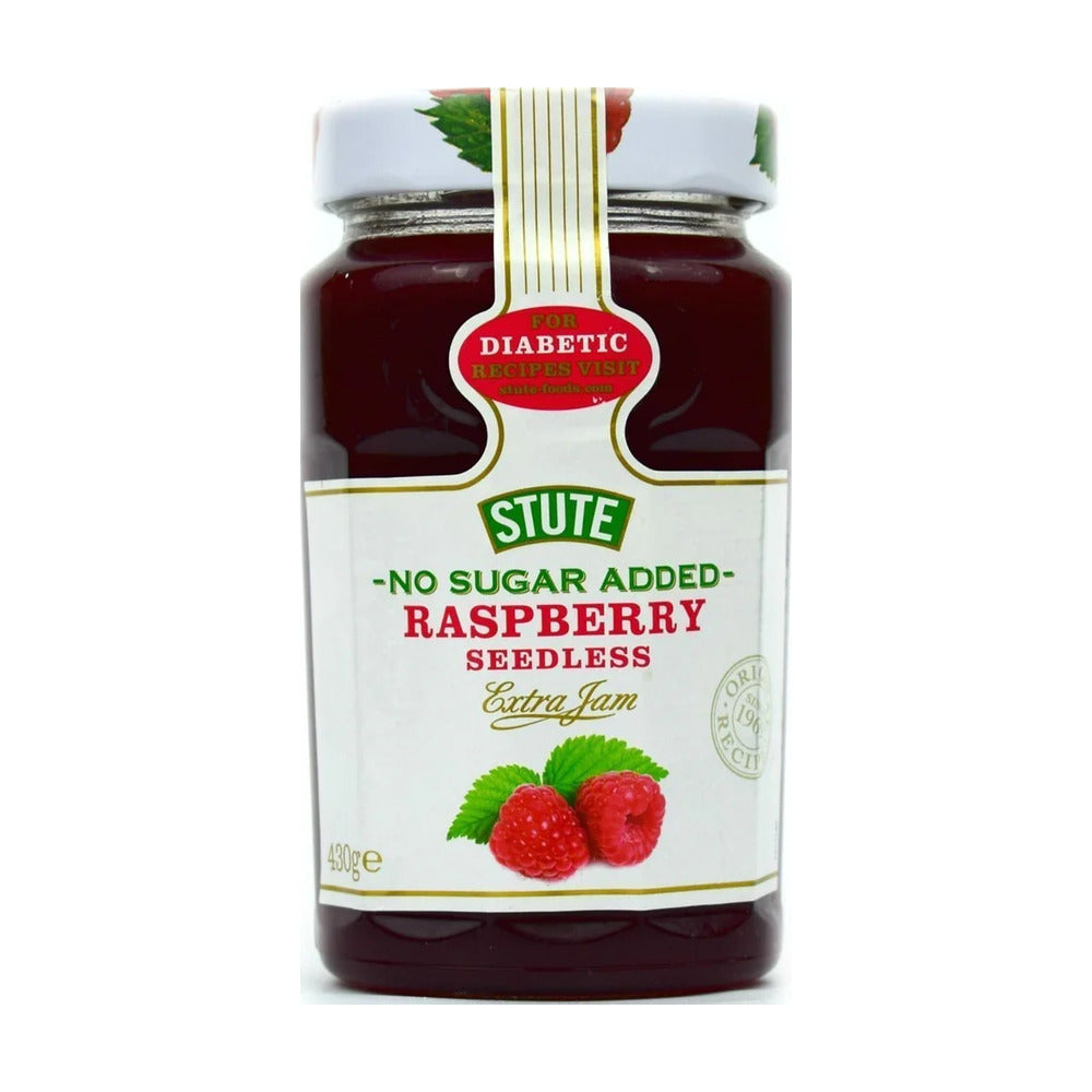 Jar of Stute no sugar added raspberry seedless jam on a white background
