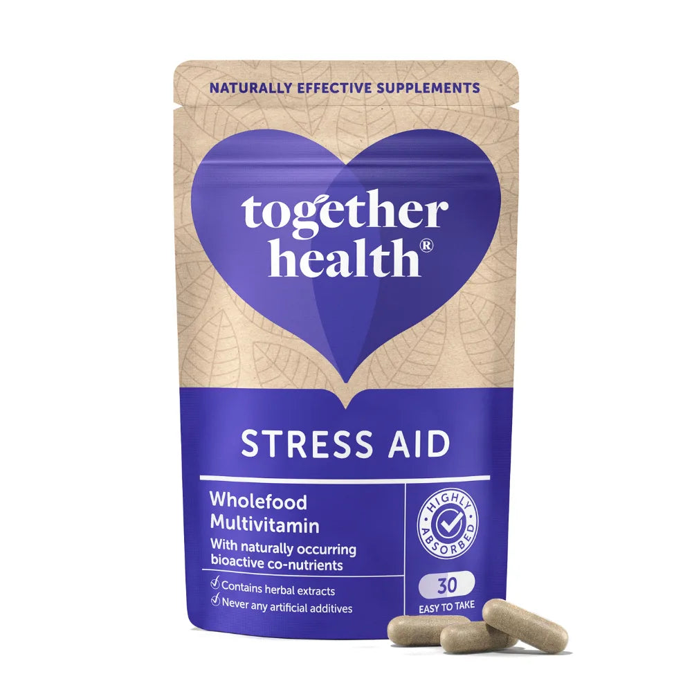 Together Health Stress Aid supplement package with purple heart logo on beige background