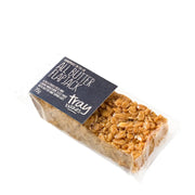 Packaged all butter flapjack with 'Tray Bakes' label on a white background