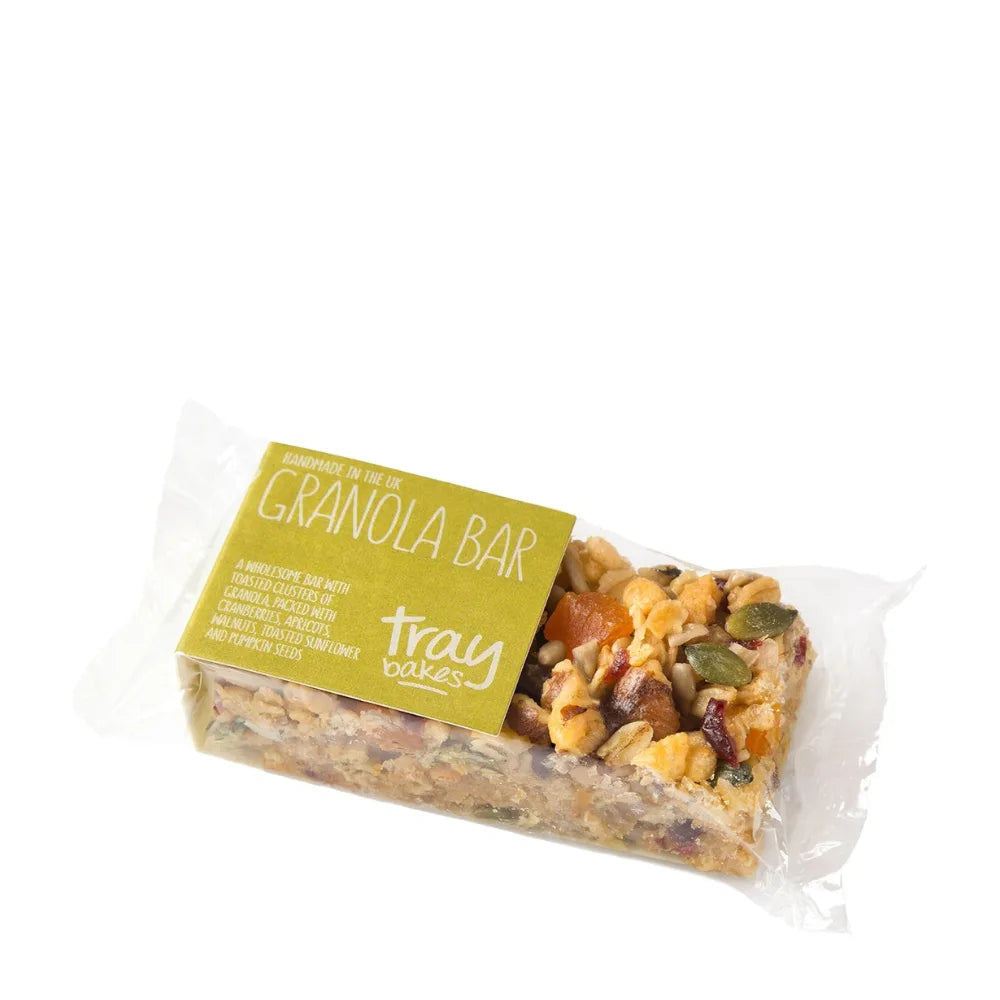 Packaged granola bar with a green label on a white background