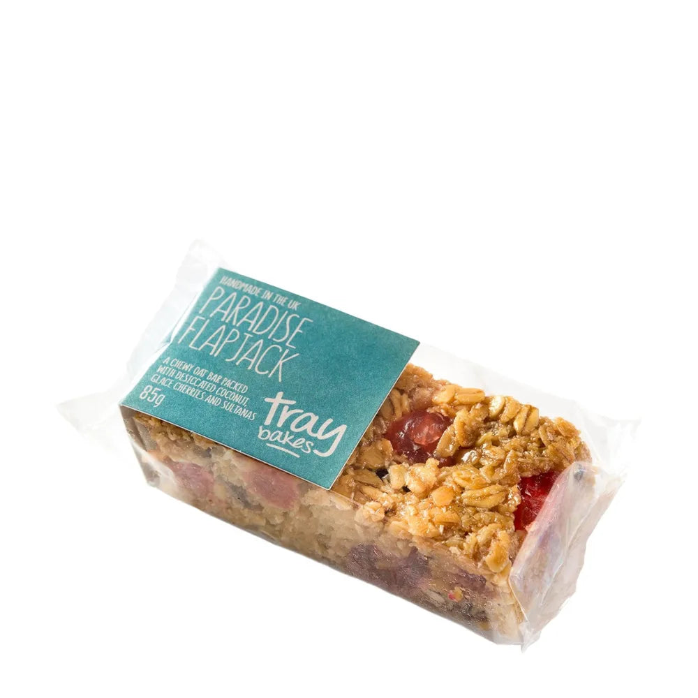 Packaged granola bar with 'Tray Bake' label on a white background