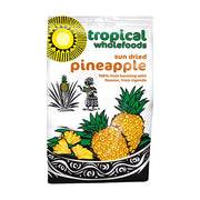 Packaging of Tropical Wholefoods sun-dried pineapple on a white background