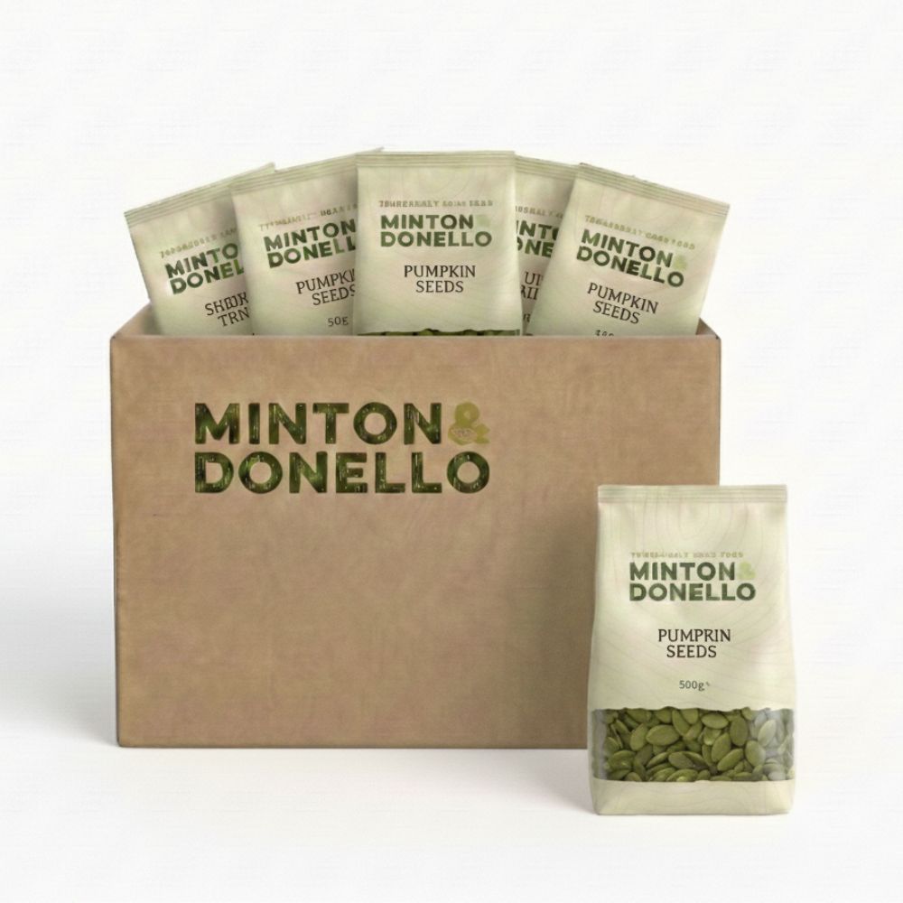 Minton & Donello pumpkin seed packages in a cardboard box on a white background