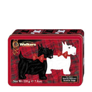 Walkers Shortbread Tin with Scottie Dogs on a red plaid background